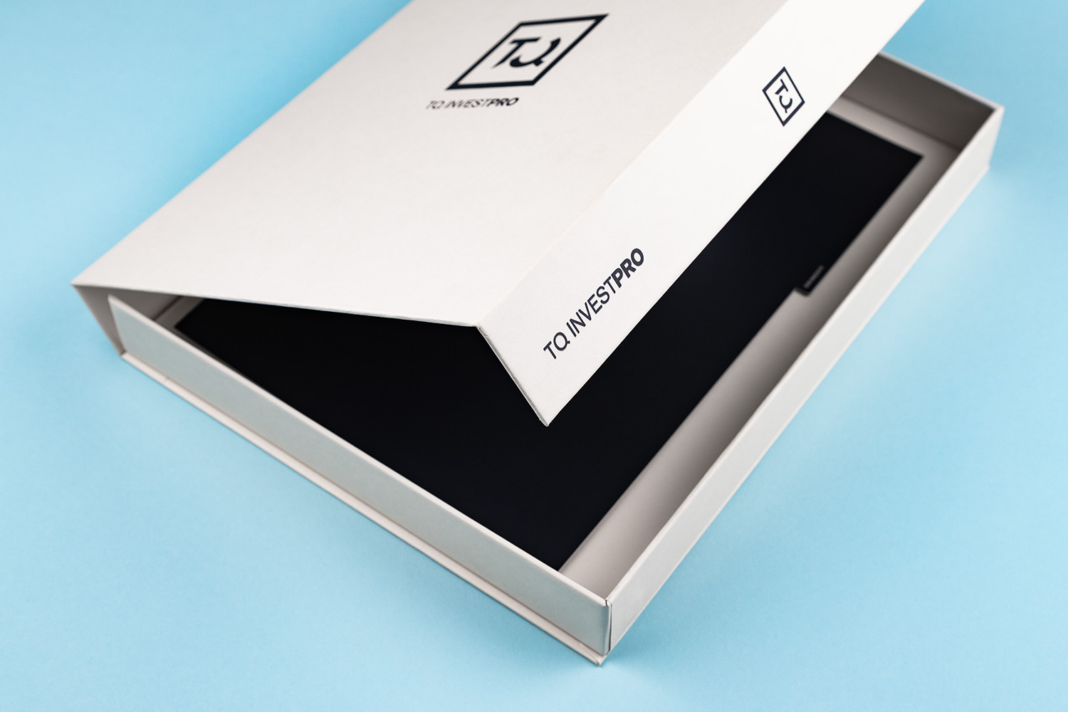 TQ Invest Pro caja impresa